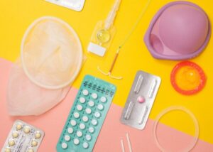Range of postpartum contraception methods including the pill, implant, IUD, condoms and diaphragm